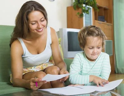 mom signing up for a dental discount plan for her daughter