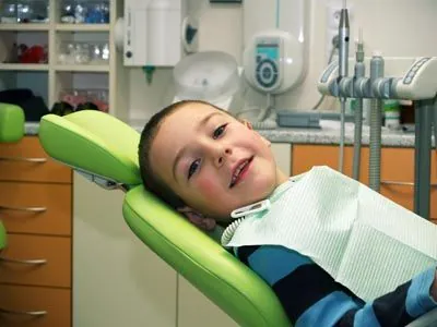 young patient smiling during his dental appointment at The Kid's Place in Boerne, TX