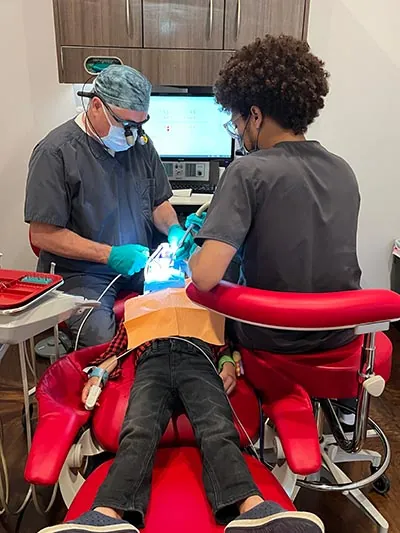 Dr. Wilkerson performing sedation dentistry on a pediatric patient